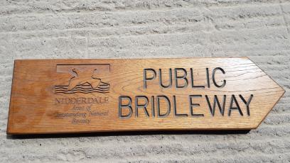 Finger post saying Public bridleway