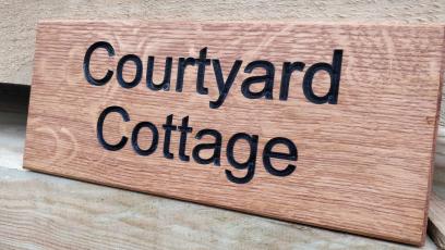 Bespoke house sign with black infill