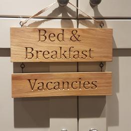 Bespoke oak routered house sign