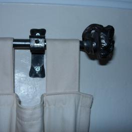 Bespoke wrought iron curtain pole with rams head