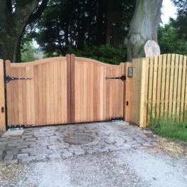 Iroko Broughton double leaf door with upward curve