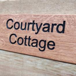Bespoke house sign with black infill