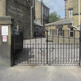 Wrought iron double leaf pair at a school entrance 