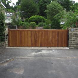 Iroko Middleton electric gate on track