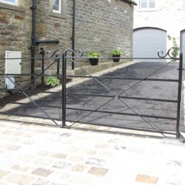 Wrought iron electric swing gate